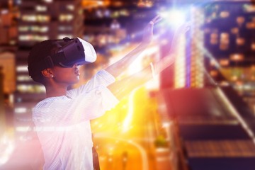 Naklejka premium Composite image of young woman gesturing while using virtual