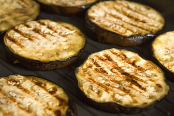 Sliced eggplant or aubergine on grill pan