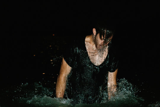 Man Rises Above Surface Of Dark Waters Gasping For Air