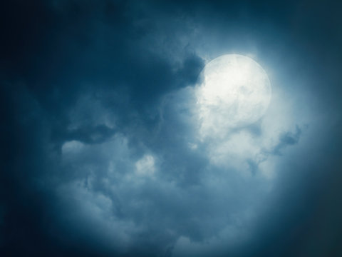 Full moon on a cloudy sky