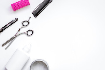 hairdresser tools on white background top view