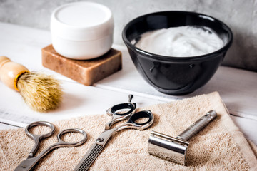 Mens hairdressing wooden desktop with tools for shaving