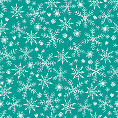 Winter seamless pattern with snowflakes.
