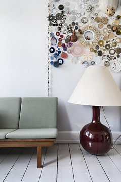 Livingroom with sofa and lamp on floor 