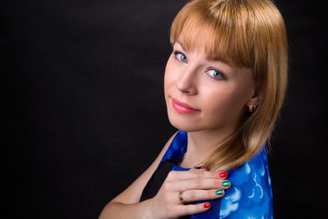 Obraz premium Portrait of a girl in a blue dress