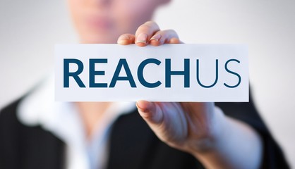Composite image of close up of businesswoman holding blank card