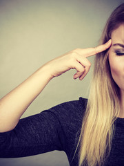 Closeup of woman thinking face expression