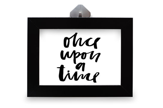 Once upon a time. Handwritten text. Modern calligraphy. Inspirational quote. Black photo frame