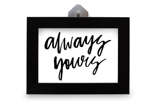Always yours. Handwritten text. Modern calligraphy. Inspirational quote. Black photo frame