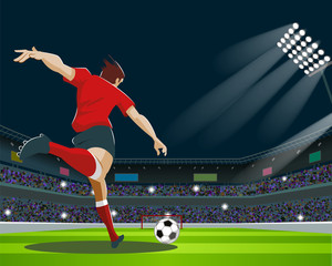 Soccer Player Kicking Ball in stadium. Light, stands, fans.