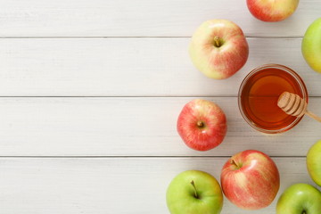 Seasonal harvest background with apples and honey