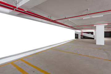 blank billboard with Empty parking garage underground interior in apartment or business building office.