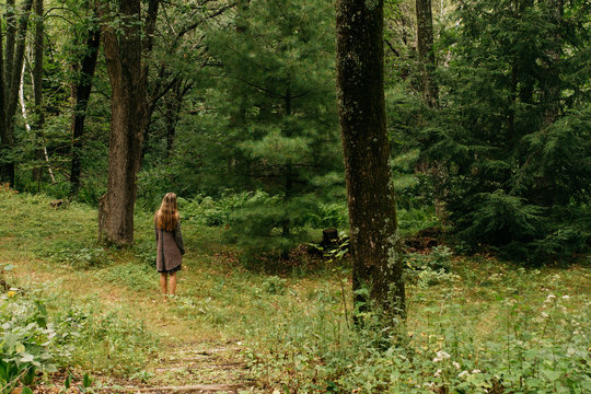 Woman on a nature walk in the forest