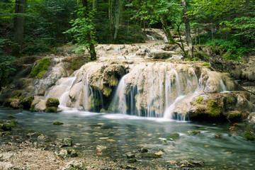 Beautiful stream waterfall in the forest