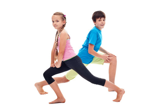 Kids doing leg strengthening and flexibility exercises