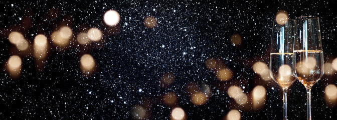 Champagne with starry sky and golden bokeh