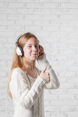 woman with headphones listening to music with pleasure