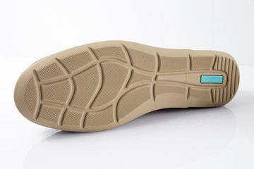 Male brown leather sandal on white background, isolated product, comfortable footwear.