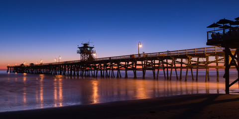 Wood Pier at Sunset blue hour - obrazy, fototapety, plakaty