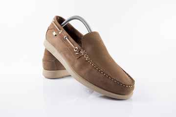 Male brown leather shoe on white background, isolated product.