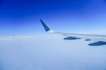 Airplane wings in the sky