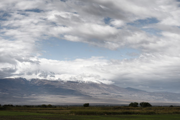 Naklejka na ściany i meble Cloudy skies over Mount Ararat in Armenia