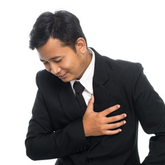 Portrait of a business man with heart attack. Isolated on white background