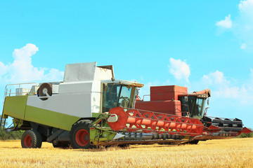 Two combine harvesters in field