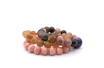 3 lucky stone bracelets on white background