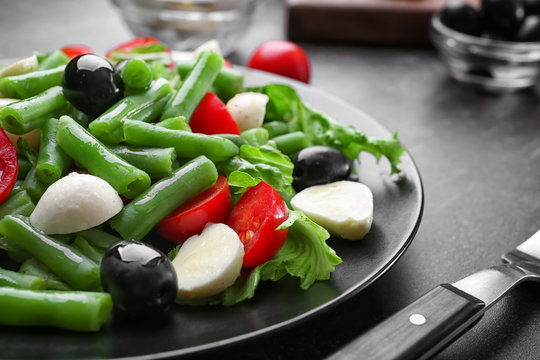 Plate of salad with green beans, closeup