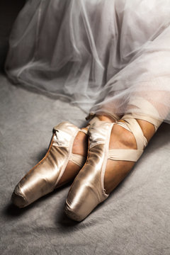 Close up of dancer's feet and shoes (classical ballerina).