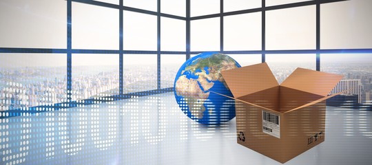 Composite image of planet earth and brown cardboard box