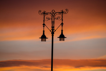 Fototapeta na wymiar Street light at sunset