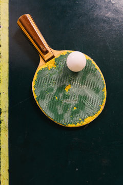 Green Table Tennis Racket And Ball