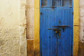 Rusty blue door in medina