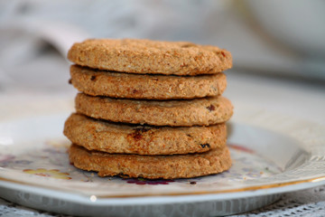 Fresh oatmeal cookies with seeds of cereals and raisins