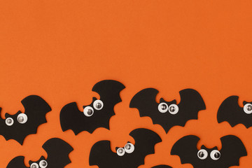 Halloween bat character shape with funny googly eyes