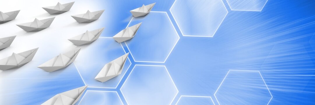 Group of Paper boats on blue background