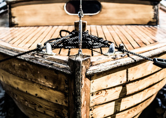 Bow of an old wooden boat - close up. 