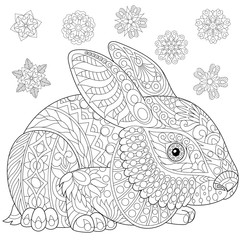 Obraz premium Coloring page of rabbit (bunny) and winter snowflakes. Freehand sketch drawing for adult antistress coloring book in zentangle style with doodle elements.
