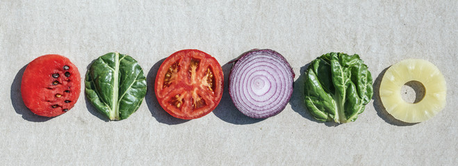 a series of colorful fruits and vegetables in the same form, circle