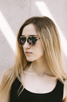 summer portrait of young woman with sunglasses