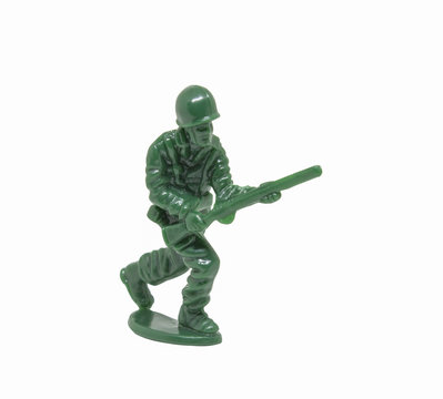 miniature toy soldier on white background; close-up