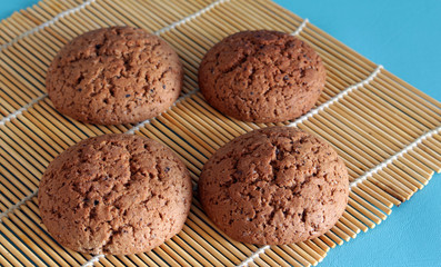 Four freshly baked homemade cookies on Makisa