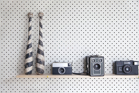 Pegboard / Perforated board with close up of shelves in a studio office