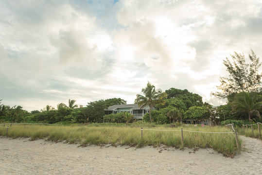 Beach Houses At Sunrise