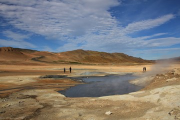 Pond with boiling mud. Geothermal area near Reykjahlid, Iceland.