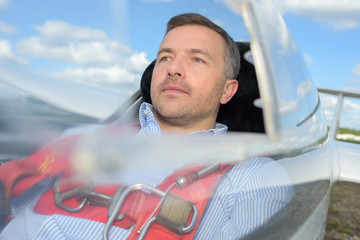 Man in single seater aircraft