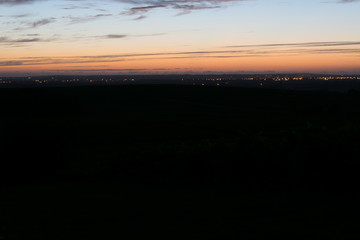 Blue hour with light trail in rural landscape