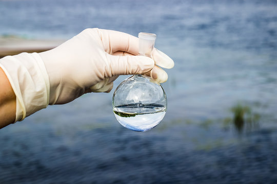 A water sample from the river. Water intake. Water abstraction.